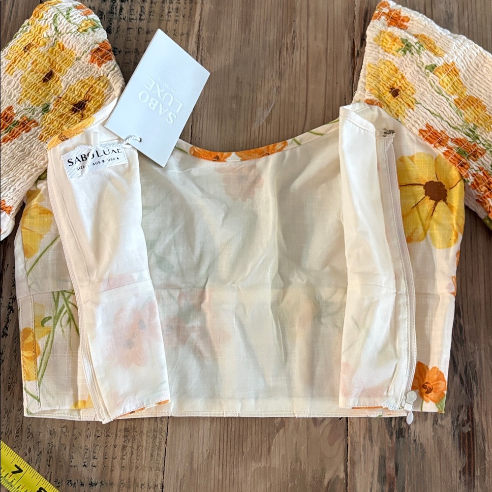 Floral Smocked Puff-Sleeve Crop Top in White with Orange & Yellow Blooms - Picture 5 of 6